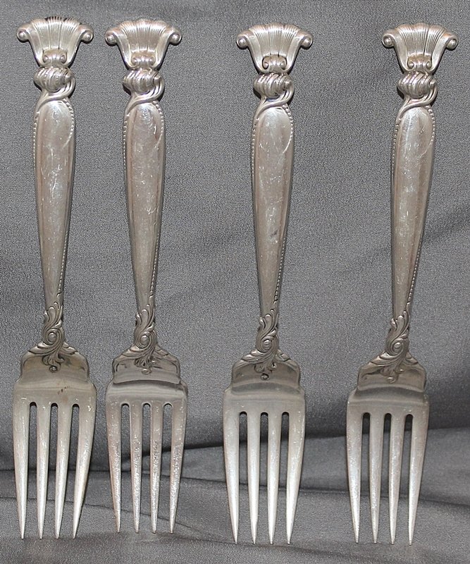 WALLACE ROMANCE OF THE SEA 4 STERLING SALAD FORKS: We present for your consideration this collection of 4 sterling silver Salad Forks , classic vintage Pattern Romance of the Sea by Wallace Silversmiths, designed by William S Warren , Solid sterling.