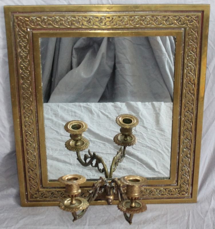 AESTHETIC MOVEMENT GILT BRASS MIRROR w SCONCES: Antique Aesthetic Movement Gilt Brass Mirror with scrolled double sconce c. 1885. The Mirror measures 16x14 and with candle sconces in 7 depth. Great aged patina, solid and well made. Wt. 11 ;pd. To s