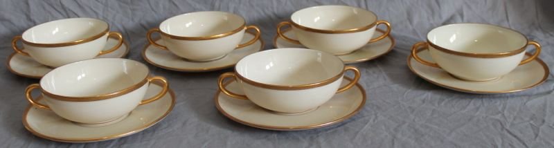6 ANTIQUE LENOX SPRINGFIELD CREAM SOUP BOWLS W SAUCERS: Set of 6 Lenox cream soup bowls & dessert plate/ saucer sets. All are from T.M. James & Sons Kansas City MO. Classic Lenox Fine China, the pattern features a Cream Rim with gold encrusted edge and was