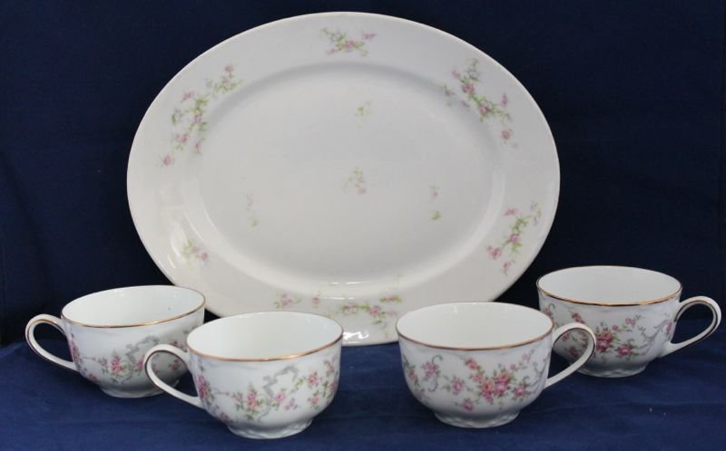 BERNARDAUD LIMOGES PLATTER, HUTSCHENREUTHER COFFEE CUPS: We are pleased to offer this fine mixed set of Limoges and Bavarian hand painted porcelain items, including a double signed Bernardaud & Co. 11 x 9 x 1" Limoges platter finished in an understated rose