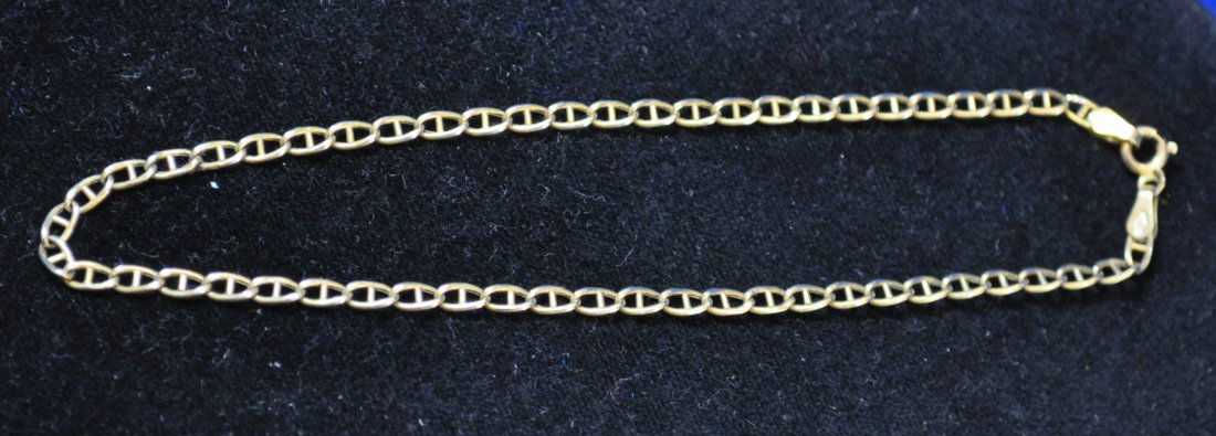 VINTAGE 14KT GOLD MARINER CHAIN ANKLET 9.5 IN XK: We are very pleased to offer this classy 14KT Gold Mariner Chain Anklet for your bidding consideration. This beautiful Mariner link chain anklet is 9.5" long, probably from the 1980-90s. It is marked