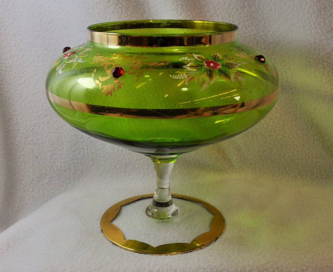 HP BOHEMIAN BLOWN EMERALD JEWEL GLASS MAGNOLIA BOWL XW: We are very pleased to offer this large 1950's Bohemian blown Emerald glass pedestal Magnolia bowl, finished in a gorgeous floral and gilt banded pattern with sparkling ruby glass jewels. Our bowl sta