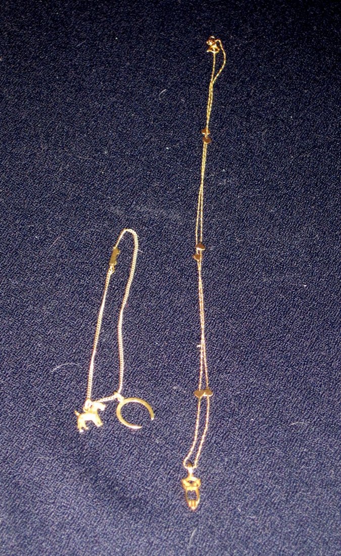 14k 10k GOLD BRACELET NECKLACE CHARMS 4grams DOG OWL XR: we are pleased to offer this charm bracelet and necklace lot. You are bidding on a 14k hallmarked heart and gittery chain necklace with a cutout 10k Owl Pendant Charm. Also in this lot is a 14k Gold I