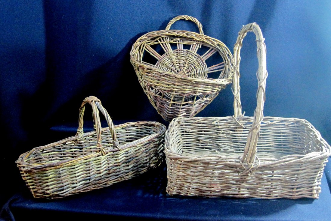 3pc VINTAGE BENT WOOD & WICKER BASKET EGG HEART XR: We are pleased to offer this three piece lot of rustic Bent Wood and/or Wicker baskets. This lot includes a large Farm Basket made of unpeeled bent wood, also a unique decorative hanging Heart Basket 