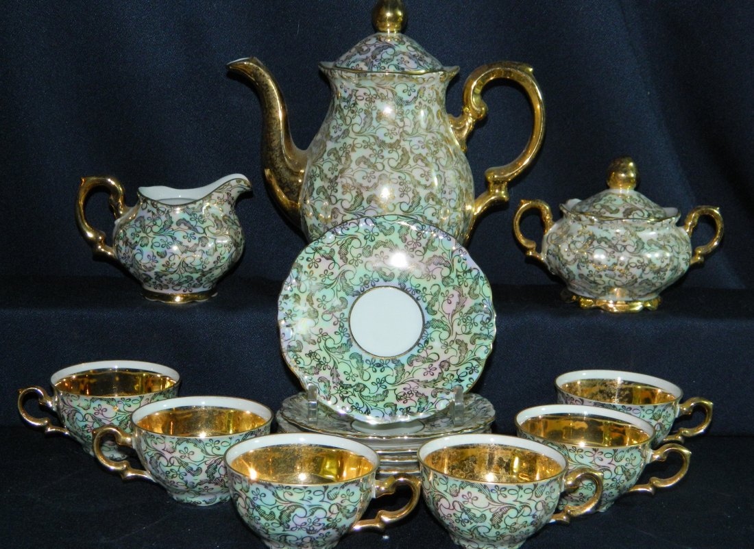 1904+ LENI PARBUS BAVARIAN LUSTER CREAM GOLD TEA SET XJ: We are extremely pleased to present this scarce NOT FOR EXPORT antique Bavarian tea service finished in a beautiful hand decorated Persian style floral Luster finish, with gorgeous gold handles & acce