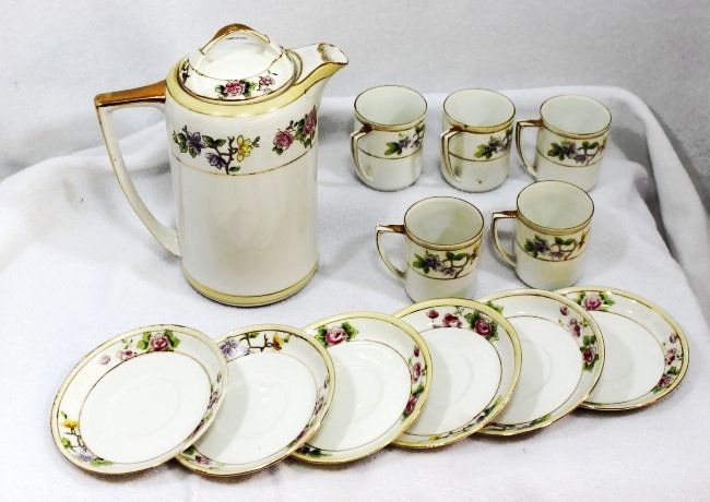 PRE 1921 HD PAINTED RISING SUN NIPPON CHOCOLATE SET XW: We are very pleased to present this handsome 1911-1921 hand painted Lotus & violet Nippon porcelain chocolate set carrying the prime collectible blue under glaze Rising Sun Nippon stamp. Our classic s