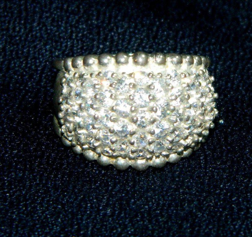 VTG STERLING SILVER PAVE RHINESTONE COCKTAIL RING XR: The photos do not capture the gorgeous sparkle of this Sterling Silver Cocktail Ring. This ring is studded with crystal pave stones- as best as we can tell they are good quality Rhinestones or CZ not 