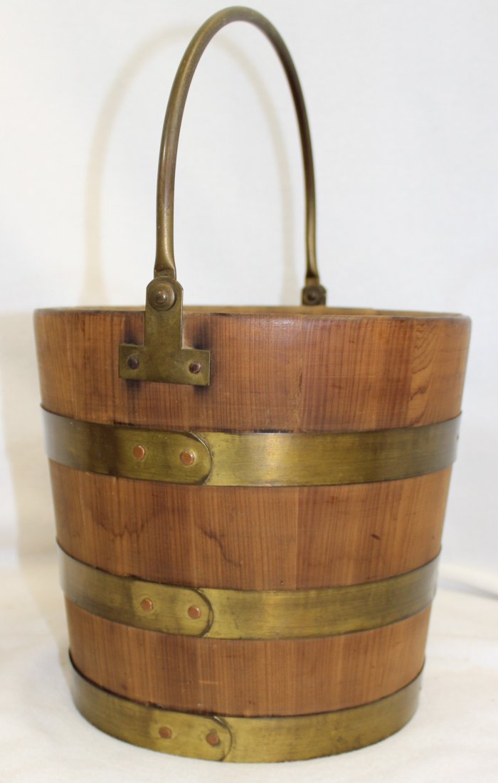 WOOD SLAT 3 BRASS BAND HANDLE FIRKIN STYLE BUCKET XW: We are pleased to offer this nice 1970s vintage wooden slat Firkin style bucket, completed with 3 brass bands, and a swivel brass handle. Though not old, it is in excellent condition, and would make a