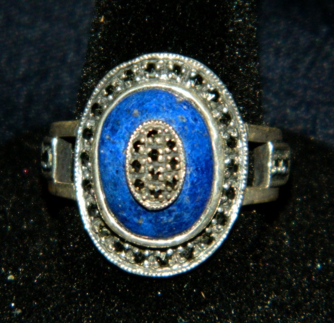 STUNNING DECO SILVER LAPIS LAZULI MARCASITE RING XR: We are delighted to feature this unique and stunning Art Deco style Sterling Silver Ring. This ring features a blue Lapis Lazuli stone with a hand set Marcasite oval frame and a Marcasite decoration i