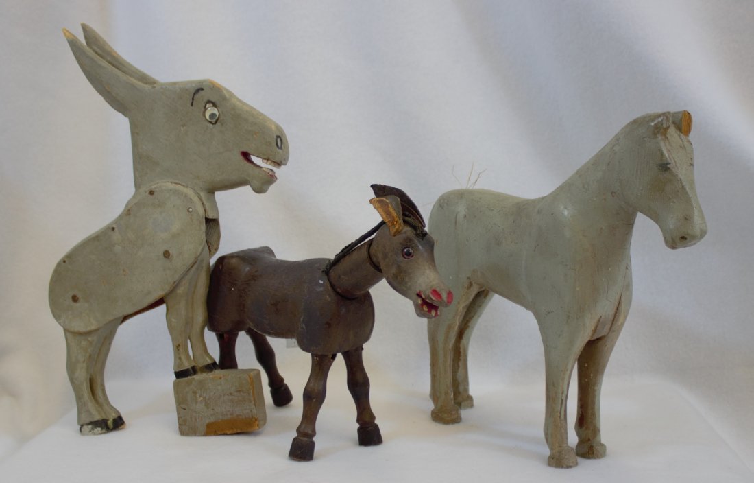 LOT 3 VINTAGE ANTIQUE WOODEN MULES HORSES SHOENHUT XC: Three Vintage Antique farm animals , wood , on the left is a wooden kicking mule from a Whirligig, center stage is a older Shoenhut Circus Mule , and to the right a primitive folk art hand carved wood