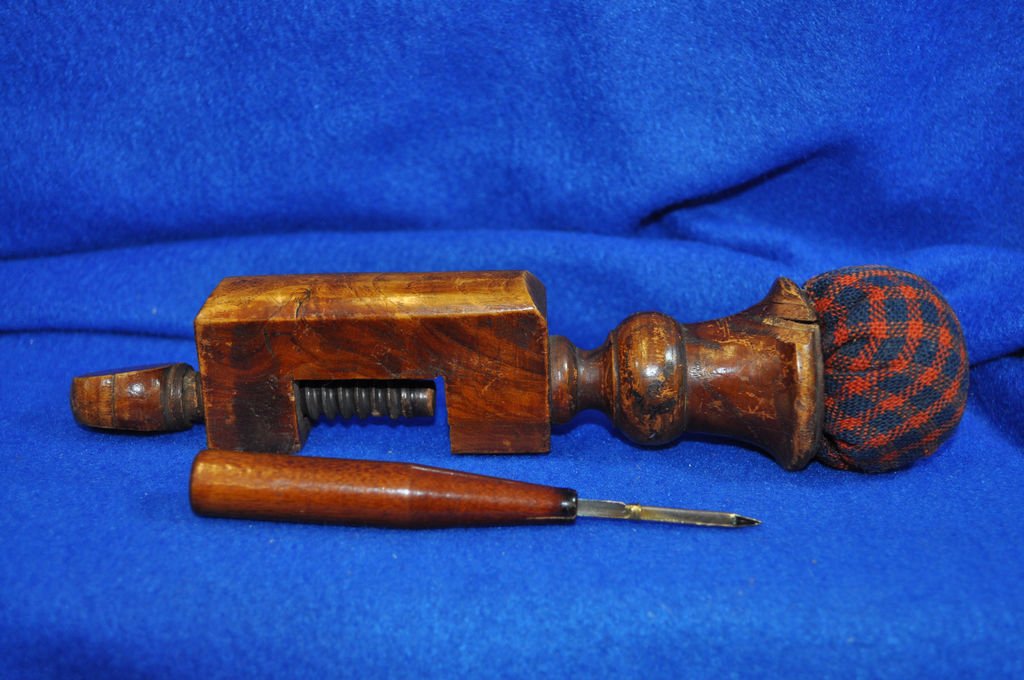 ANTIQUE 1800s VICTORIAN SEWERS CLAMP RIBBON THREADER XC: Offered for your consideration a rare mid 1800's Victorian Sewers Clamp with pin cushion top , I believe its Mahogany from the Ohio area , the other piece is a Vintage Ribbon Threader *** Total Weight
