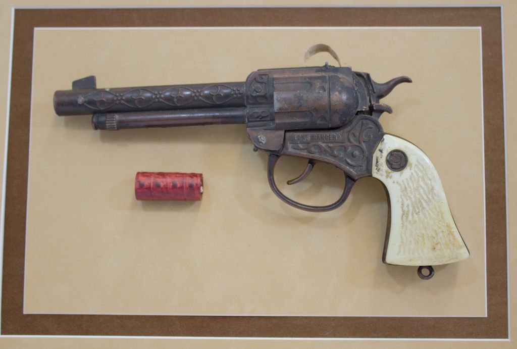 VTG MATTEL 1960s LONE RANGER MOUNTED TOY PISTOL XC: We are pleased to offer this Vintage 1950's Mattel Lone Ranger Toy Gun. This Toy .32 cap gun is die cast, engraved wtih a nickel finish and copper scroll metal grips. Nice condition for a toy of this