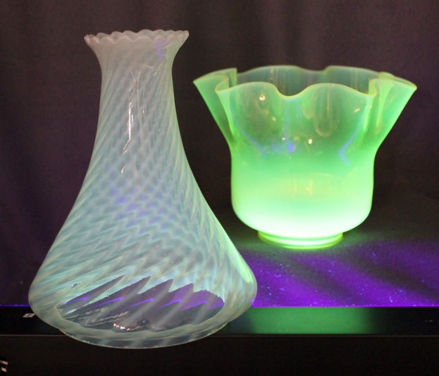 1910s ENGLISH BLOWN VASELINE OPALESCENT LAMP SHADES XC: We are very pleased to present this gorgeous pair of hand blown English Edwardian period lamp shades. The hurricane chimney features a lovely Opalescent swirl pattern, and has a light glow under black