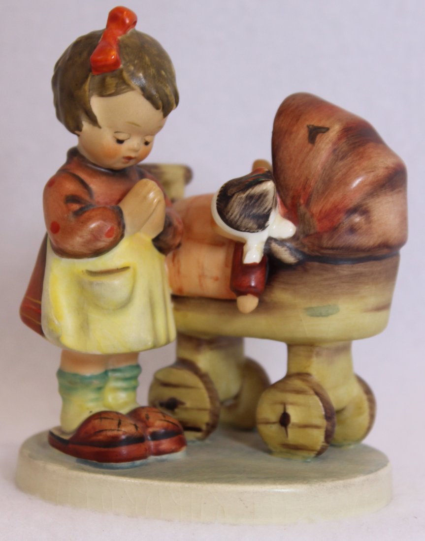 1960-72 HUMMEL DOLL MOTHER TMK 3 SMALL STYLIZED BEE XG: We proudly offer this first of a classic set of Hummel figurines from the TMK #3 era ca. 1960-1972. Our number one example is a TMK-3 Doll Mother, featuring a little girl praying above her baby doll i