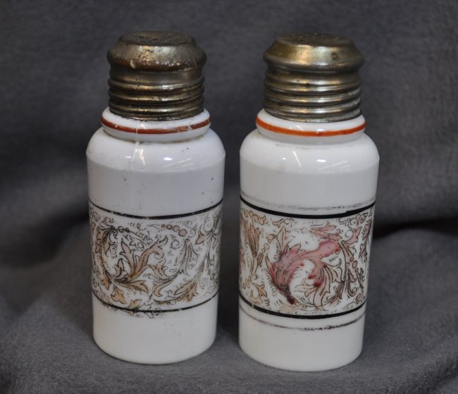 1905 OPAL GLASS FLORAL TRANSFER CREASED NECK SHAKERS XJ: We are very pleased to offer this fine matched pair of 1900-1910 Opal glass cylinder shakers with period creased necks. We are unable to make a positive ID for this antique pair, but the glass quality