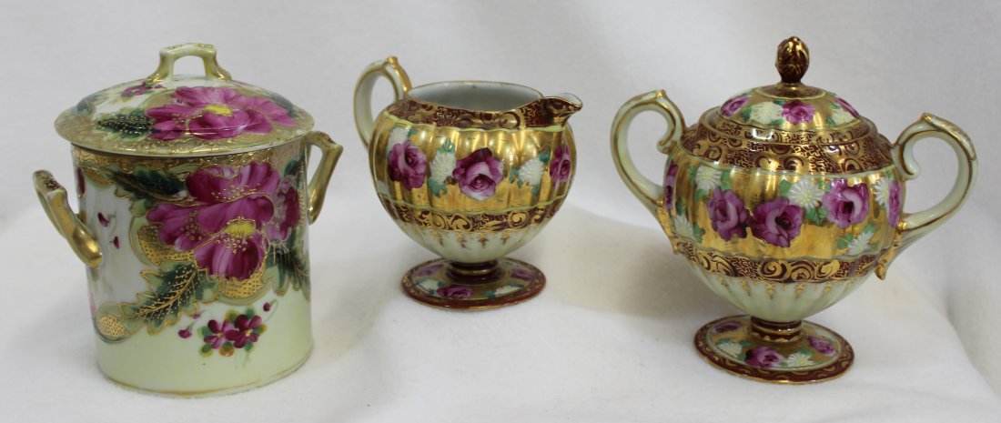 HP MATCHING NIPPON GILDED CREAM & SUGAR, + MILK XW: We are very pleased to present this likely 1910's matched pair of hand painted Nippon pedestal base creamer & covered sugar with splendid tea rose floral bands and lovely gilt highlights. We also have