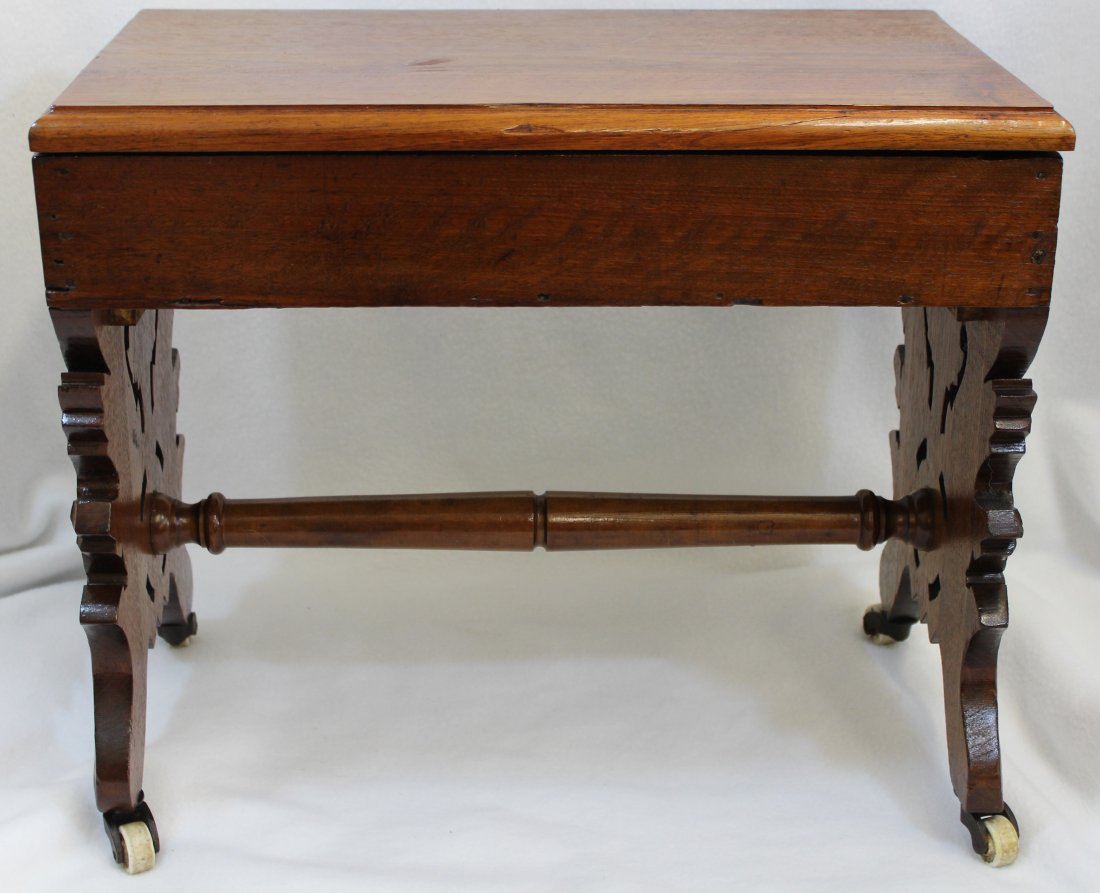 ANTIQUE WALNUT VICTORIAN LIFT TOP SEWING BENCH XW: This is an original Ornate Victorian Walnut lift Top Sewing bench , circa late 1800's , their has been a repair to the hinge area and the hinges have been replaced. *** Weight: 11# - Measurements: 18.