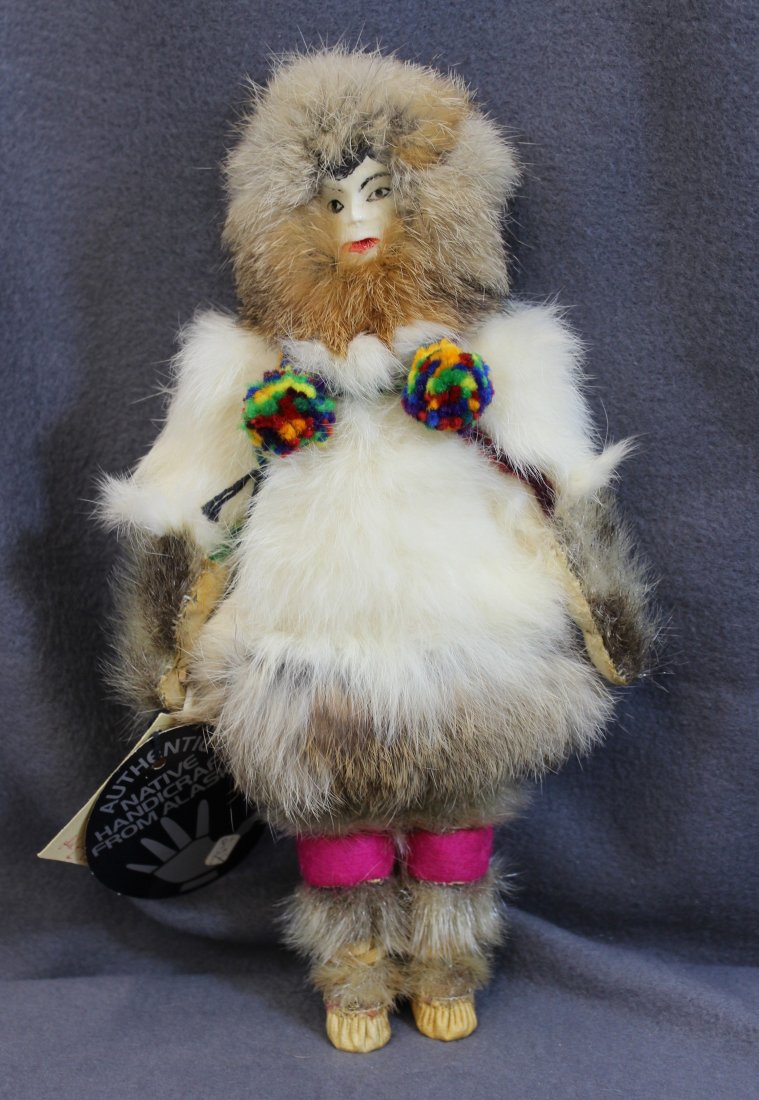 NATIVE AMERICAN INUIT ESKIMO MOTHER DOLL IVORY FUR XW: Authentic Alaskan Native American Eskimo Mother Doll, purchased in Alaska in the 1970's , signed by the Native artist Martha Nockkadak , Ivory face , rabbit parka , sealskin pants and muckluks , one o