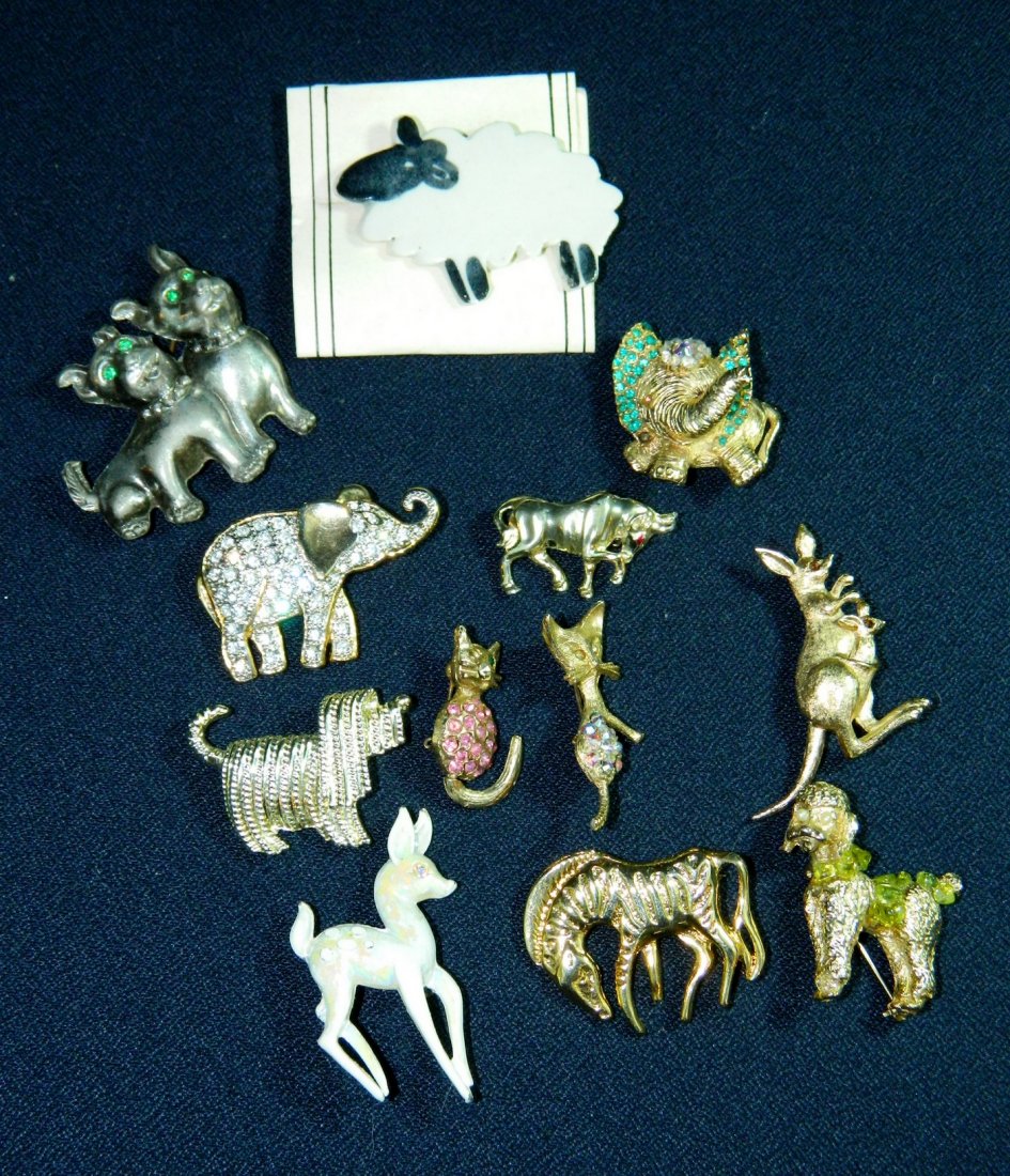 VTG 4 LEGGED FRIENDS 12PC ANIMAL BROOCH LOT XR: We have gathered a dozen of your favorite Four Legged Friends in the form of Vintage and Modern Vintage Brooches. This lot includes: Aunt Lillys Porcelain Sheep on card, a pair of pewter puppies with 