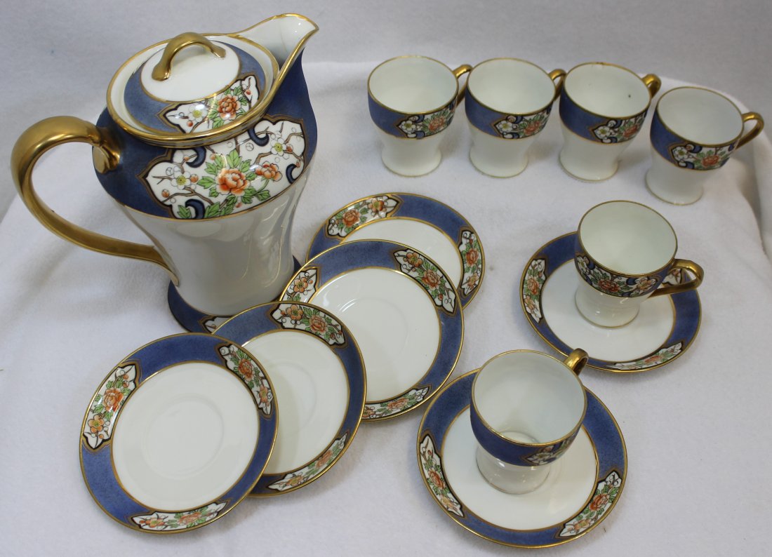 PRE 1921 HP NIPPON MORIMURA BROS LOTUS CHOCOLATE SET XW: We proudly offer this wonderful pre 1921 Nippon chocolate set, featuring original hand painted Morimura Bros imported items, representing a bulbous top chocolate pot and (6) matching cups and saucers.