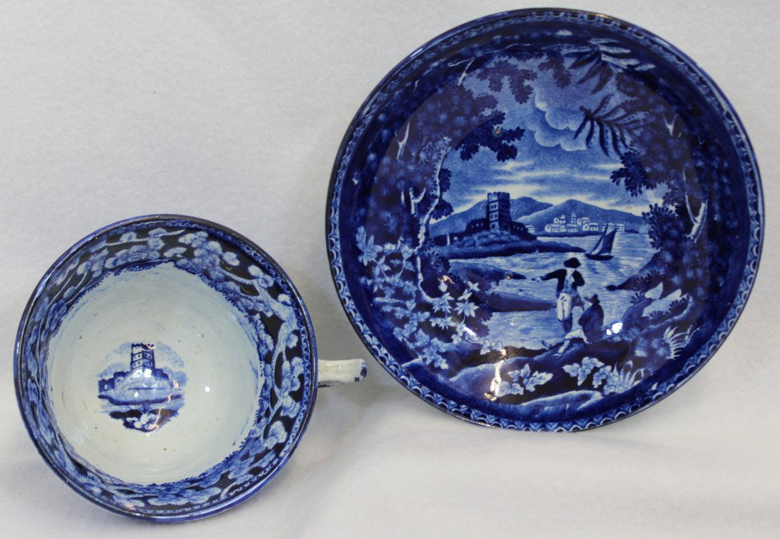 RARE 1820s JAMES & RALPH CLEWS FLOW BLUE CUP, SAUCER XG: We are extremely pleased to present this RARE showcase pre-Victorian deep matching Flow Blue cup and saucer by James & Ralph Clews between 1818 & 1834. This incredible matching pair features a gorgeou