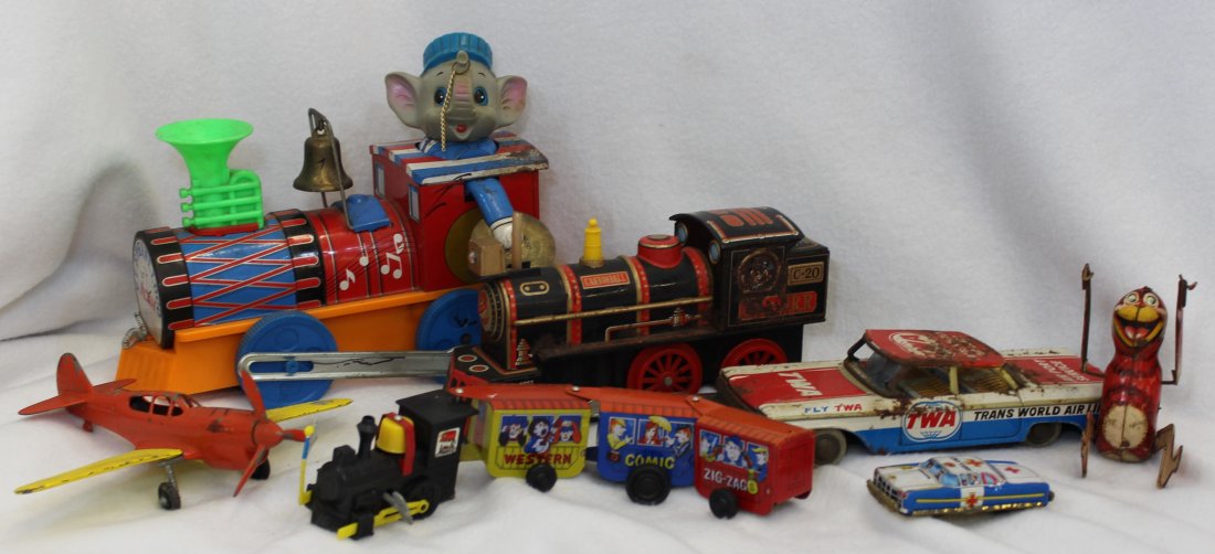 VTG TIN LITHO & DIE CAST PLASTIC TOYS WHOLE OR PARTS XT: We are pleased to offer this mix and match lot of toys from the tin lithography to the latter model die cast plastic style. Here is a list of our items. Elephant Musician Loco - b/o mfg. by Modern Toy
