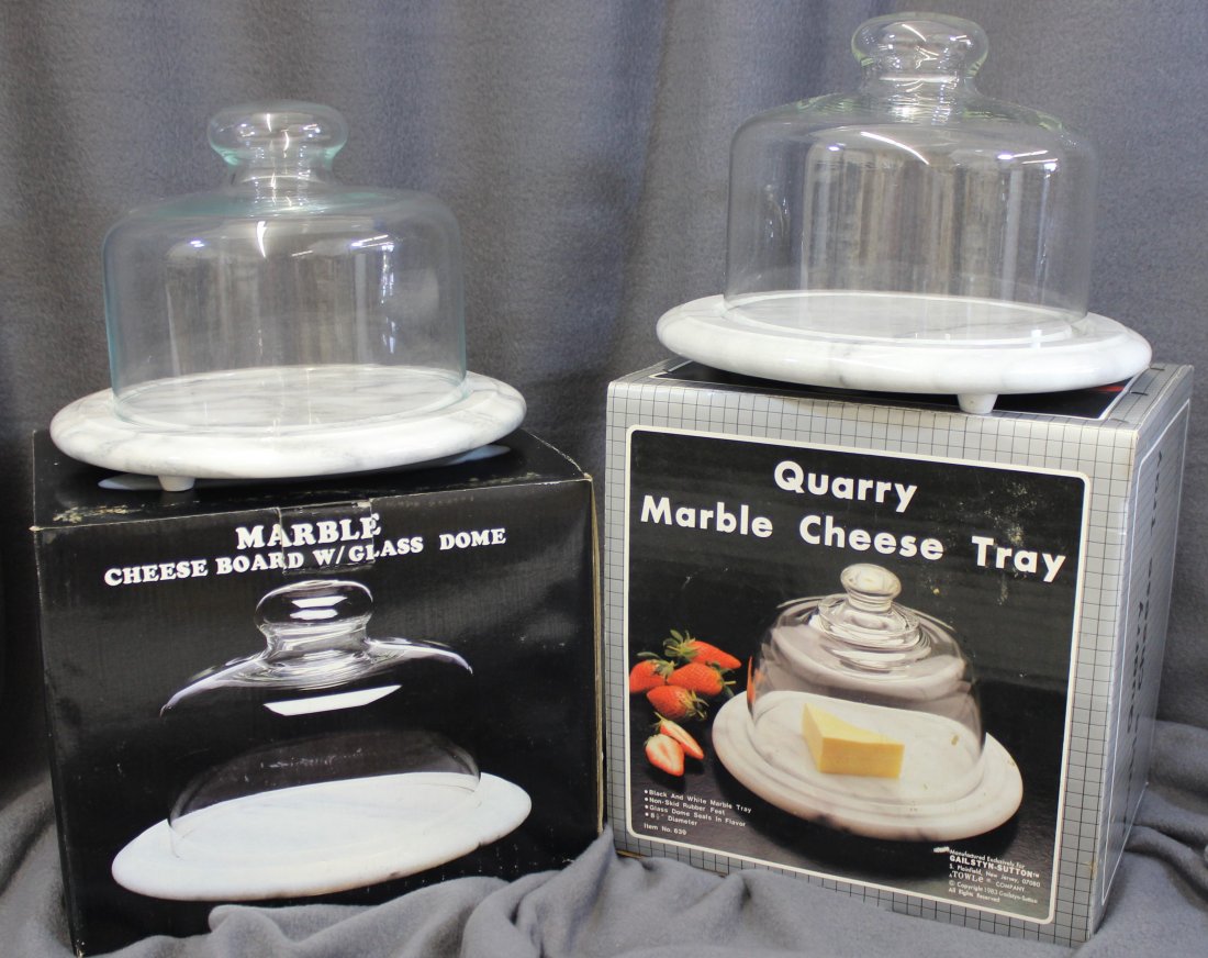 MARBLE CHEESE TRAYS W/ GLASS DOMES ORIG BOXES XW: Here we have two marble cheese trays with glass domes in their original boxes for your bidding consideration. Both of these footed Cheese Trays are in excellent condition. Towle measures: 8.5x8.5x6; N