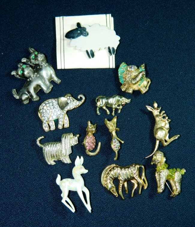 VTG 4 LEGGED FRIENDS 12PC ANIMAL BROOCH LOT XR: We have gathered a dozen of your favorite Four Legged Friends in the form of Vintage and Modern Vintage Brooches. This lot includes: Aunt Lillys Porcelain Sheep on card, a pair of pewter puppies with 
