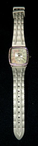 RET JUDITH RIPKA LADIES GRAY MOTHER OF PEARL WATCH XR: We are happy to offer this retired Ladies Watch by Judith Ripka, tested and in working order, overall appearance is as new(see condition notes below). This watch features a textured, pearlized, light 