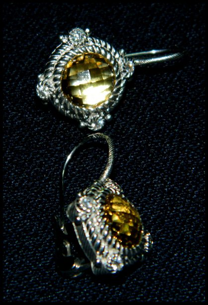 JUDITH RIPKA CANARY YELLOW SILVER CZ EARRINGS XR: We are happy to offer this pair of beautiful earrings by Judith Ripka in a style we haven't seen recently! These are large round multi-faceted Canary Yellow stones bezel set in a wide Sterling Silver 