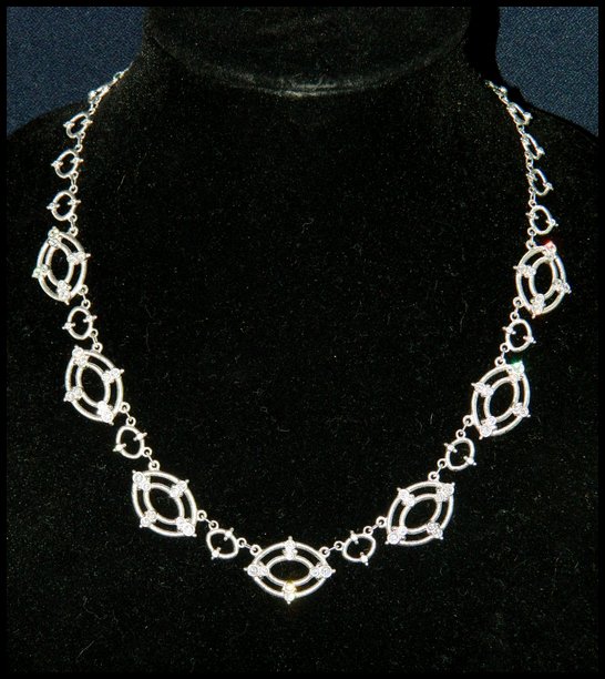 JUDITH RIPKA STERLING SILVER DOUBLE LINK NECKLACE XR: We are delighted to offer this gorgeous Judith Ripka Sterling Silver and Diamonique crystal Necklace. This necklace features a fancy textured oval and double-oval Link design with a trademark Heart lo