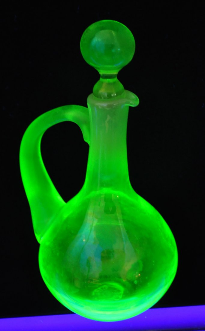 1997 GIBSON HB VASELINE OPALESCENT IRIDIZED CRUET XV: The AEAA is very pleased to present this next piece of valuable Vaseline Opalescent glass from the respected Loren (Butch) Morse collection. This lot represents a scarce & lovely Gibson Glass hand blo