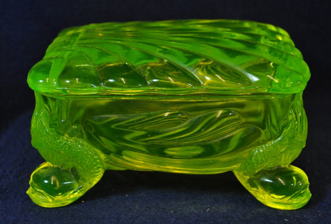 1980s BOYD VASELINE CLAM SHELL DOLPHIN CIGARETTE BOX XV: The AEAA is very pleased to present this next piece of valuable Vaseline glass from the respected Loren (Butch) Morse collection. This lot represents a handsome 1980s Boyd Art Glass, Vaseline Caprice 