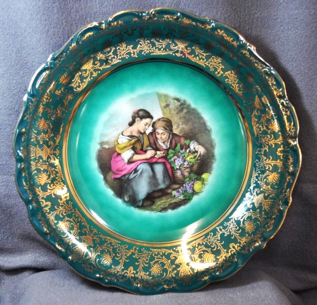 1960s CARL SCHUMANN BAVARIA GRAPE PICKERS CHARGER XW: The AEAA is very pleased to present the first of two, beautiful Carl Schumann 1960s, Bavarian copiously gilded Emerald ground,European girl grape pickers center transfer large charger with hand painte