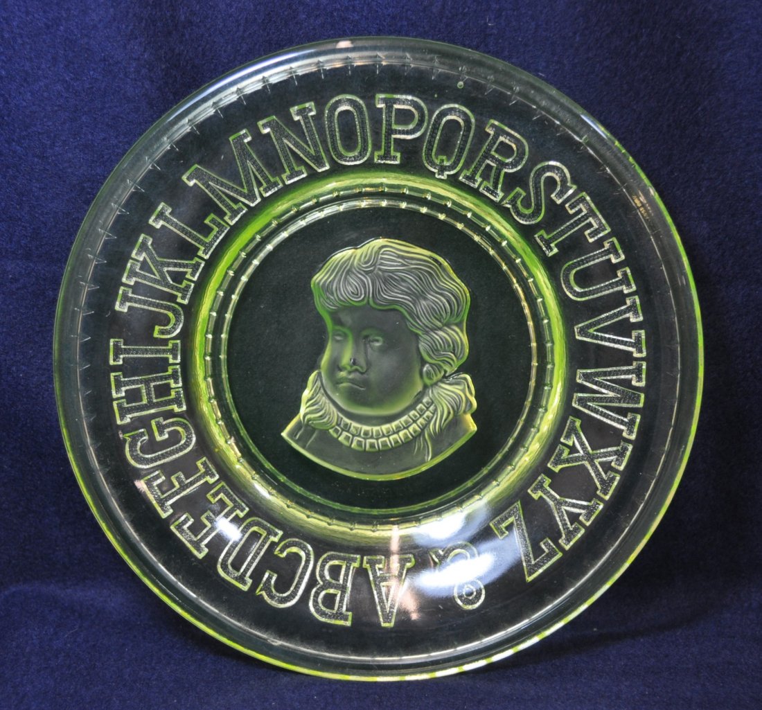 VINTAGE CLAYS CRYSTAL WORKS EMMA ABC's DISH XV: Clay's Crystal Works Vaseline ABC's dish w/ frosted child center medallion *** Weight: 1# 4oz Measurements: 8 x 8 x 1.25The AEAA is very pleased to present this next piece of valuable Vaseline glass f