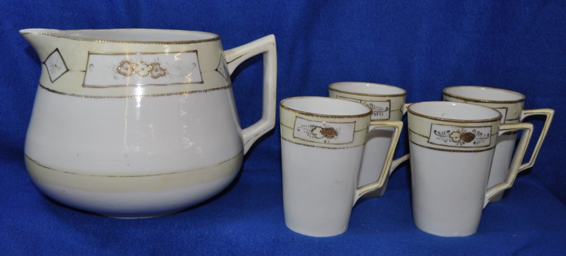 PRE-1921 TE-OH HAND PAINTED NIPPON 5 PC LEMONADE SET XW: The AEAA proudly offers this next group of beautiful, original hand painted pre-1921 Nippon items. This is a very nice Lemonade set in a lite cream color including the pitcher & 4 cups, two marked wit