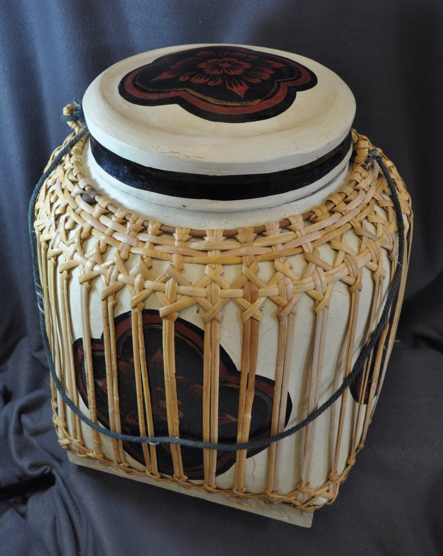 1990s INDIA HD MADE REED, MACHE SNAKE CHARMER BASKET XW: The AEAA is very pleased to present this hand made, woven reed & formed paper mache lidded snake charmers Cobra basket. Our example has brilliantly painted brown side 4 leaf floral medallions, and the