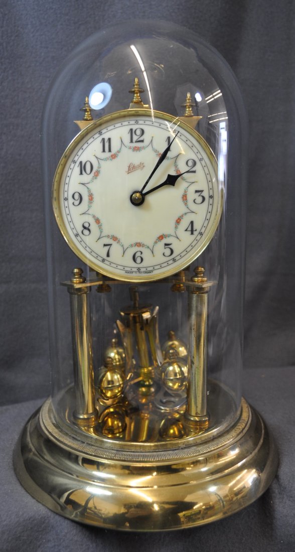 1980s SCATZ GERMAN METAL DRUM ACTION SHELF CLOCK XJ: The AEAA is pleased to offer this 1980s German vintage shelf clock with a plastic frame and a metal Jahresuhren fabrik 49 Germany drum action. It has its original key, weights & original globe, but ne