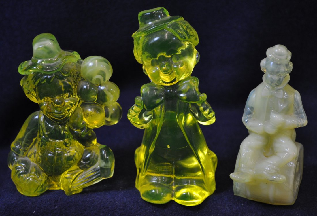 1980s BOYD, MOSSER JIGGS QUINN VASELINE GLASS CLOWNS XV: The AEAA is very pleased to present this next set of valuable Vaseline Opalescent glass items from the respected Loren (Butch) Morse collection. This lot represents a marvelous group of three clowns, 