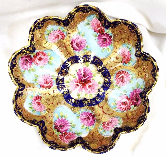 1920s HP NIPPON COBALT SCALLOPED FLORAL CENTER BOWL XW: The AEAA is very pleased to present this spectacular hand painted 1920s Nippon home market lobed, Chrysanthemum floral medallion center bowl. Our example is finished in a brilliant Cobalt over Turquoi