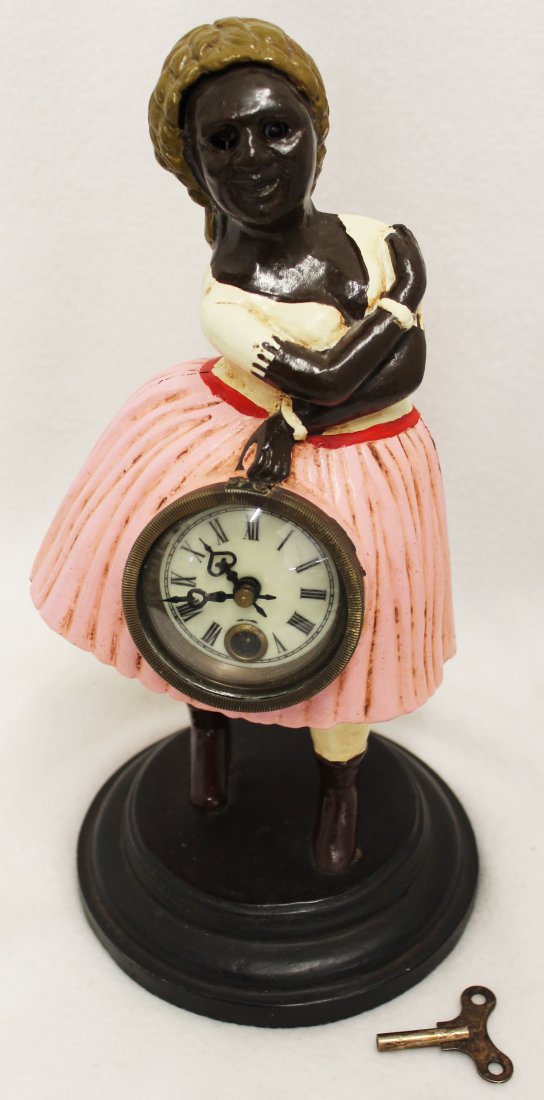 BLINKING / ROCKING EYE CLOCK TOPSEY BLACK AMERICANA: The following treasure is from the living estate of Ailene & Buddy Ford; noted dealers and lifelong collectors of exceptional antique & vintage heirlooms. This lot presents the classic Blinking Eye cl