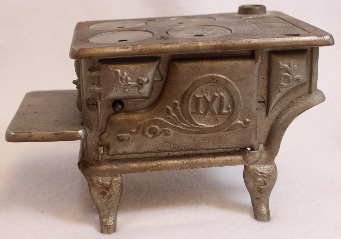 ARCADE IXL TOY WOOD BURNING TOY STOVE: The following treasure is from the living estate of Ailene & Buddy Ford; noted dealers and lifelong collectors of exceptional antique & vintage heirlooms. AEAA is proud to present this Arcade Mfg Co D