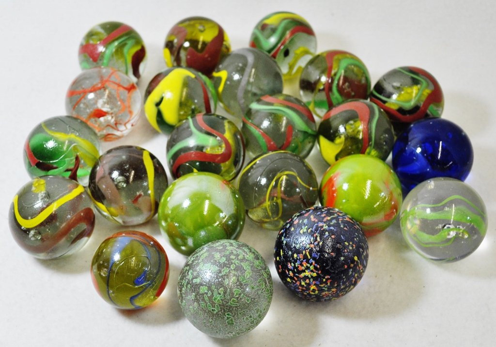 20th CENTURY MACHINE MADE 1.5-1.875 INCH SWIRL MARBLES: WE SHIP! The AEAA is proud to present this stunning lot of (22) large 20th century machine made marbles. Our forms represent, multi colored opaque & transparent swirls, and several speckled opaques. A