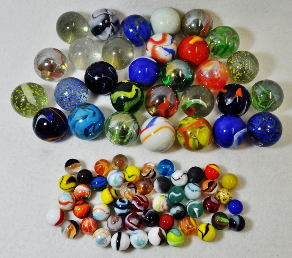 20th CENTURY MACHINE MADE .5-1.375 INCH DIVERSE MARBLES: WE SHIP! The AEAA is proud to present this stunning lot of approximately (80) count 20th century machine made marbles, with an occasional valuable transitional or two included. Our forms represent, mu