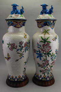 (2) Large Antique French Longwy Covered Vases: (2) Antique French Longwy Covered Vases. These vases come apart into 3 sections (top, body and base). Tops having stylized blue foo dogs mounted to lids. Vases having butterfly and flower motif throug