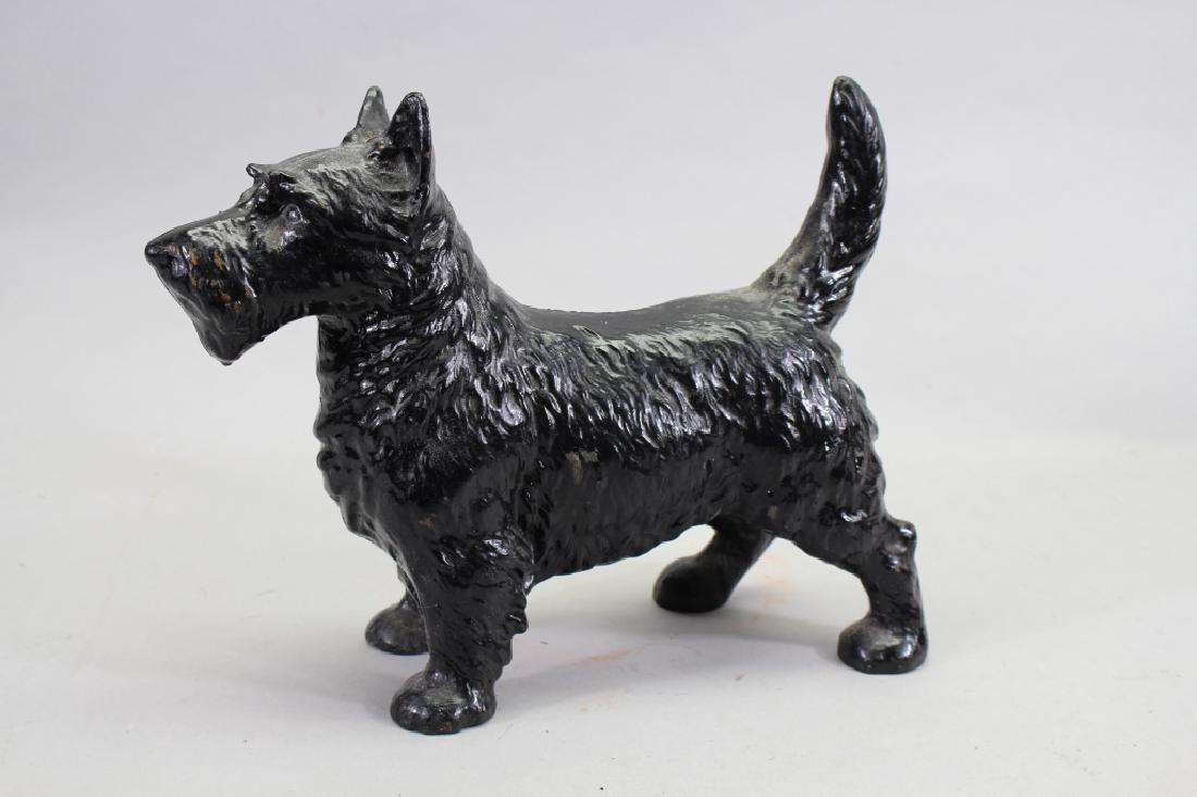 Iron Dog Form Door Stop: Iron Dog Form Door Stop. Size: 8.75 x 11.75 in.