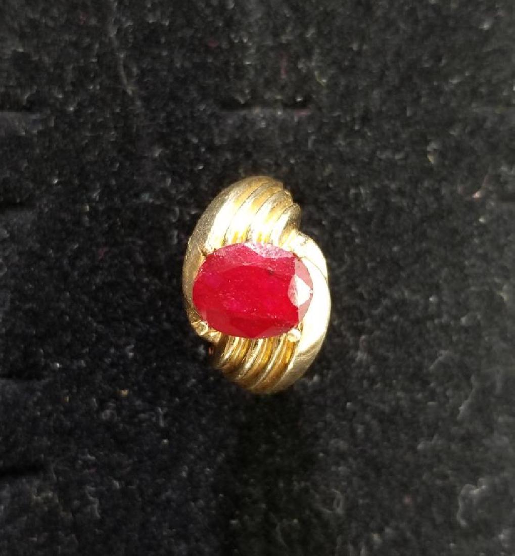 10k Gold & Possibly Ruby Ring: 10k Gold & Possibly Ruby Ring. Marked 10k inside band. Ring Size: 8.5