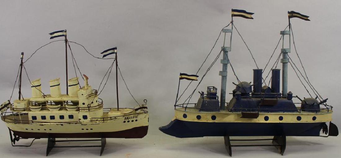 (2) Ship Models on Stand: (2) Ship Models on Stand. Sizes: 10.75 x 13.25 / 12.25 x 16 in.