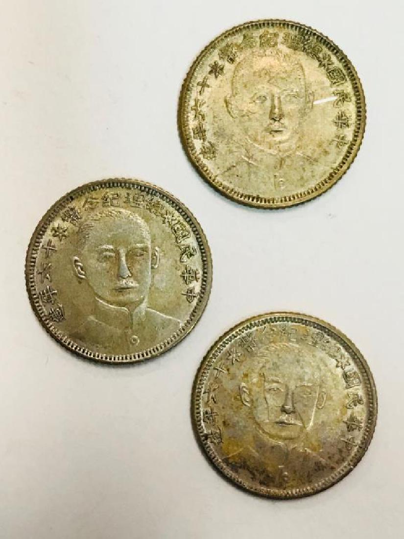 Three (3) Sun Yat Sen coins (1 of 2)