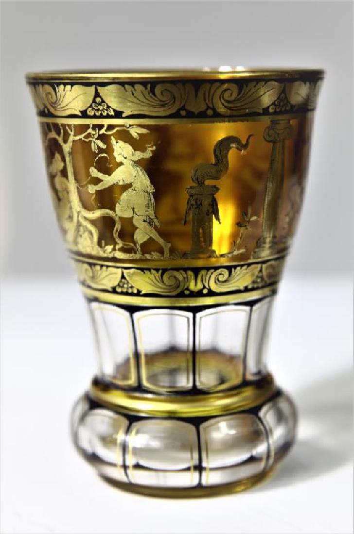 (1) Clear crystal vase with amber staining: (1) Clear crystal vase with amber staining and applied gold gilding, decorated with mythological figures 5 1/2" h x 3" base x 3 15/16" rim